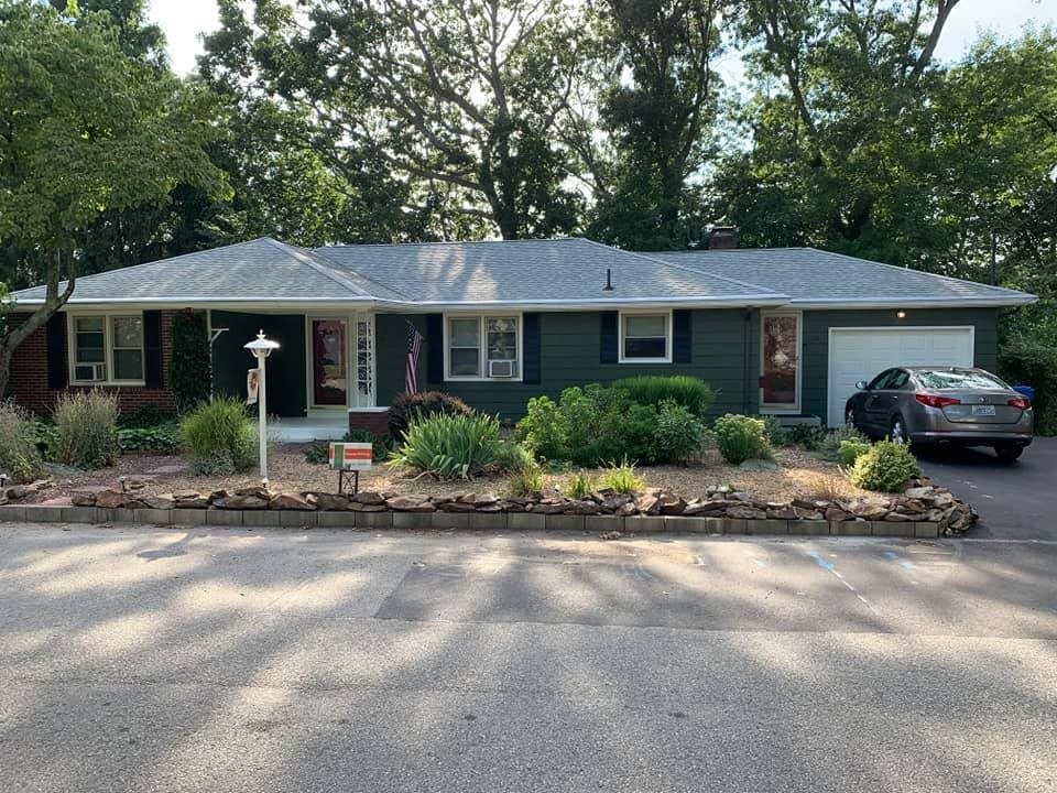 Ranch home exterior painted by Genesis Painting in Rhode Island