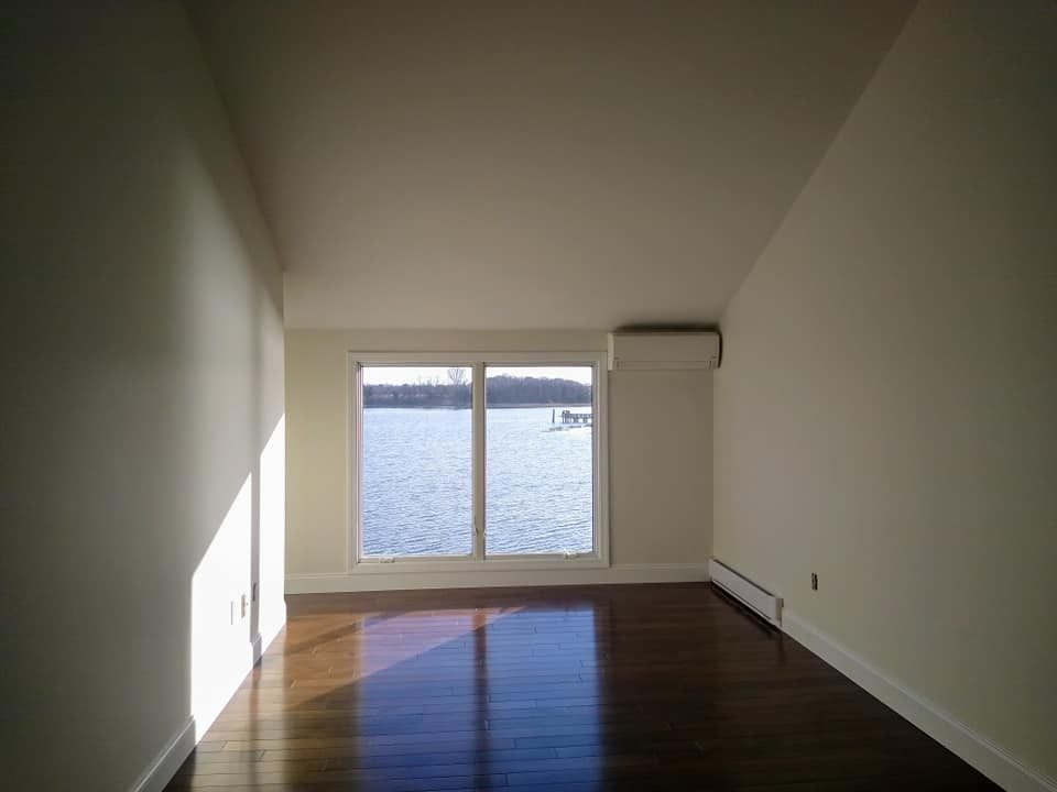 Smooth, freshly painted interior walls by Genesis Painting