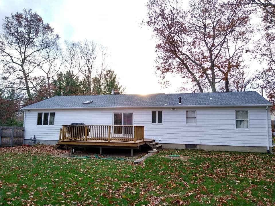 Rhode Island home exterior in the fall serviced by Genesis Painting
