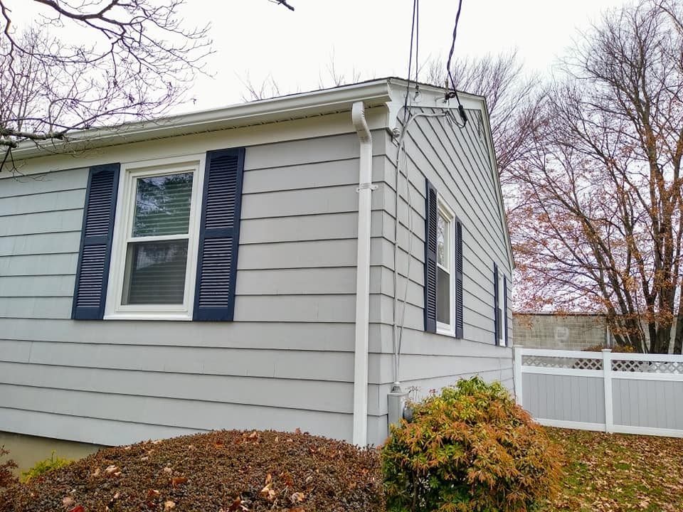 Exterior trim and shutters painted by Genesis Painting