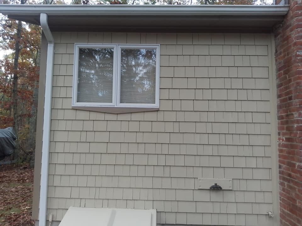 Painted cedar shingle siding by Genesis Painting